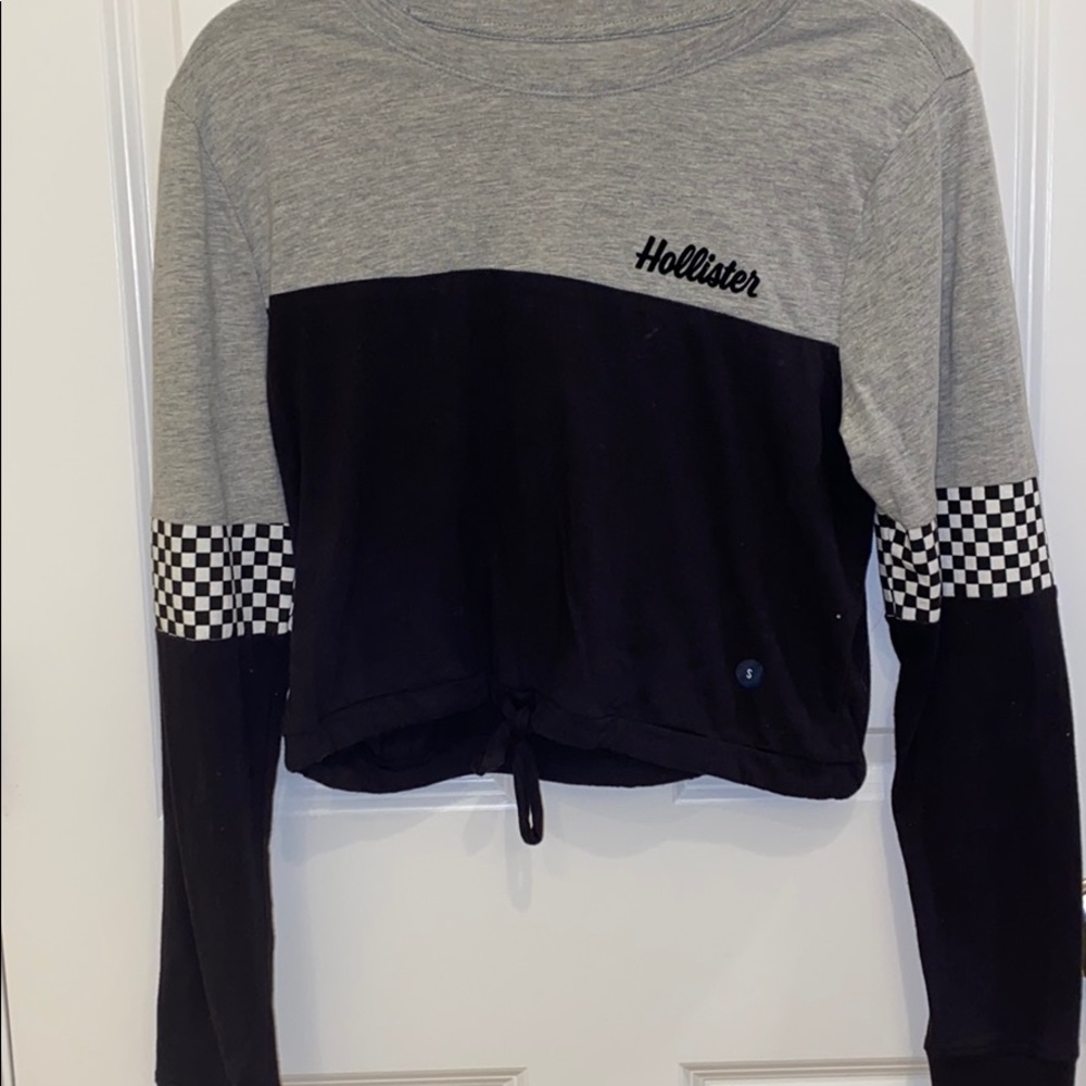long sleeve cropped shirt.